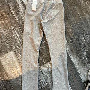 Calia women’s Large LustraLux Collection High-Rise Slim Flare Splits. Neutral.